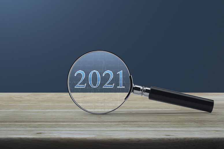 Suurennuslasi ja vuosi 2021