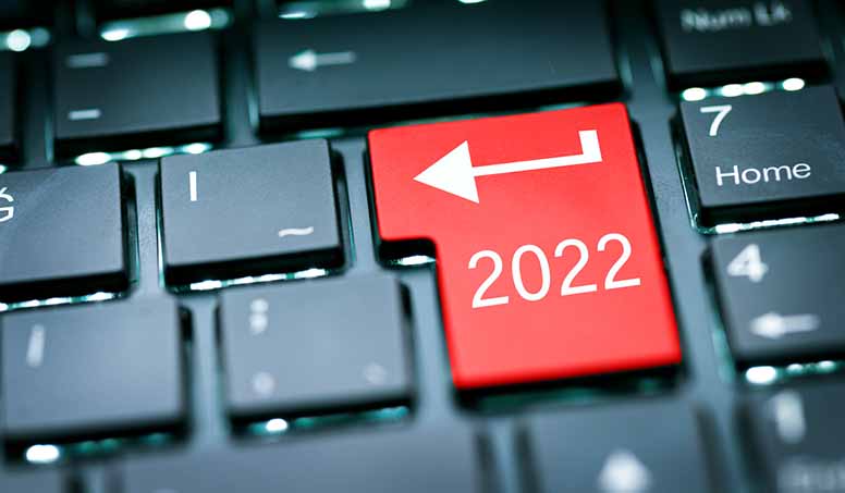 Tietokoneen näppäin ja vuosi 2022