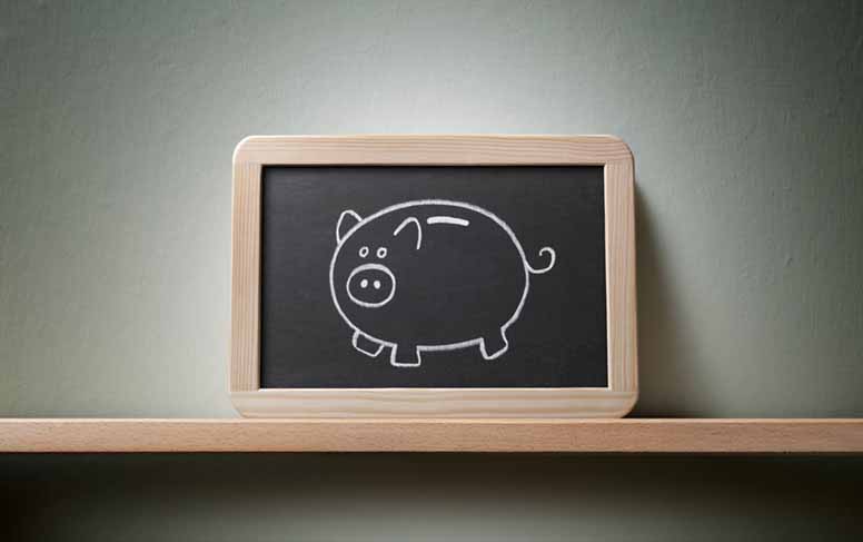 Säästöpossu liitutaulussa