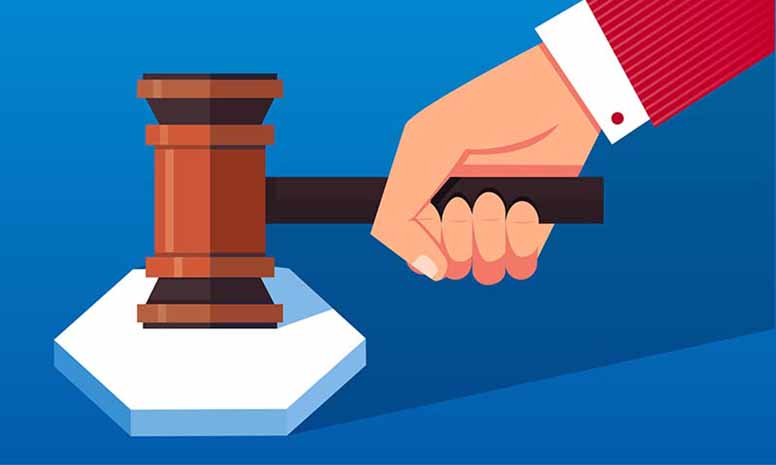 Huutokauppiaan käsi ja vasata